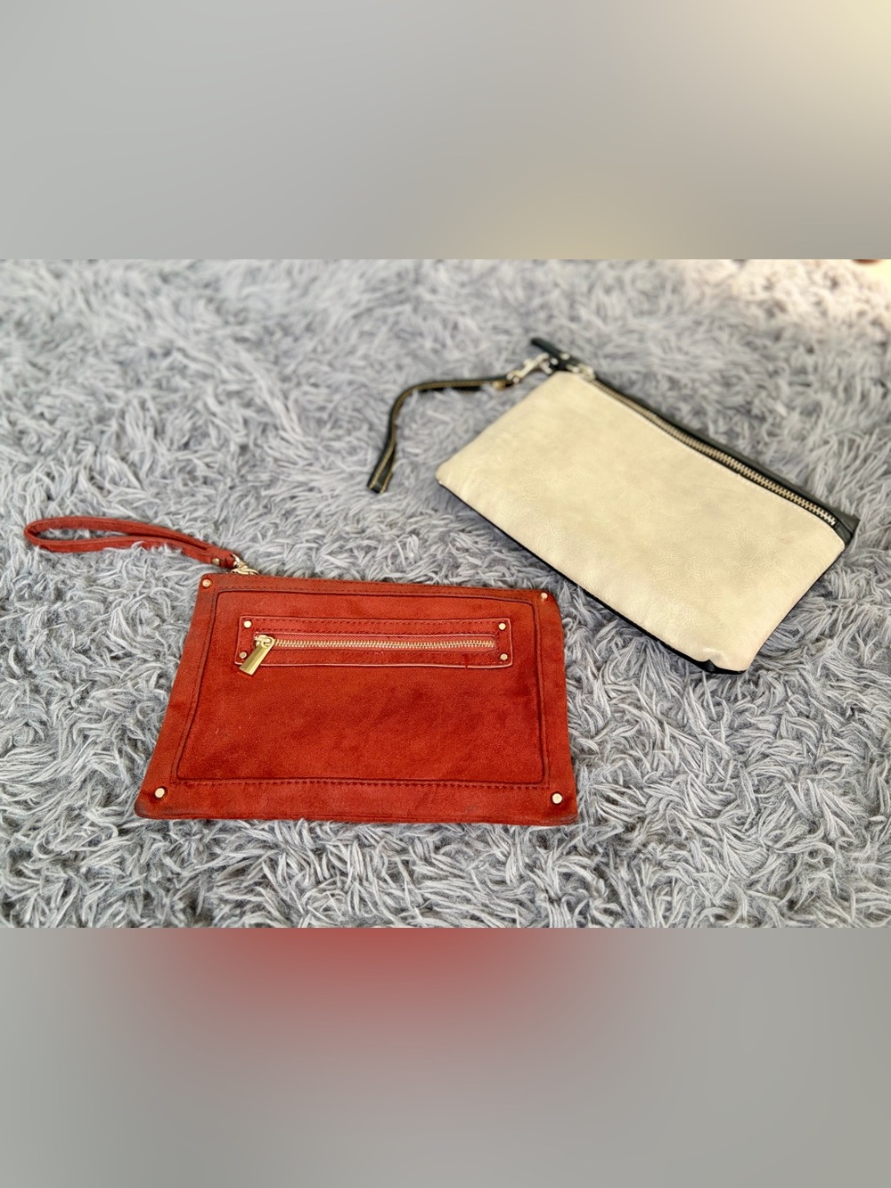 Express 2 clutches in 2 different styles suede and leather